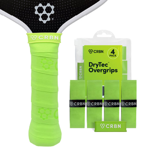 CRBN DryTec Overgrips 4-Pack in Lime, wrapped on a pickleball paddle handle beside the packaging