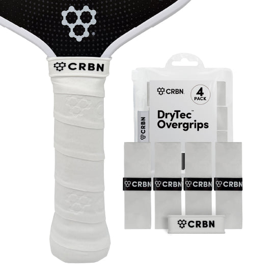 CRBN DryTec Overgrips 4-Pack in White, wrapped on a pickleball paddle handle beside the packaging