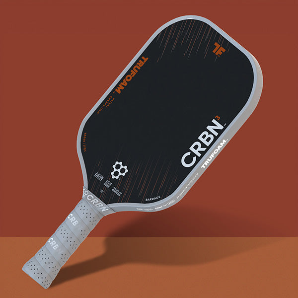 CRBN³ TruFoam Barrage Elongated paddle angled against a rust background.