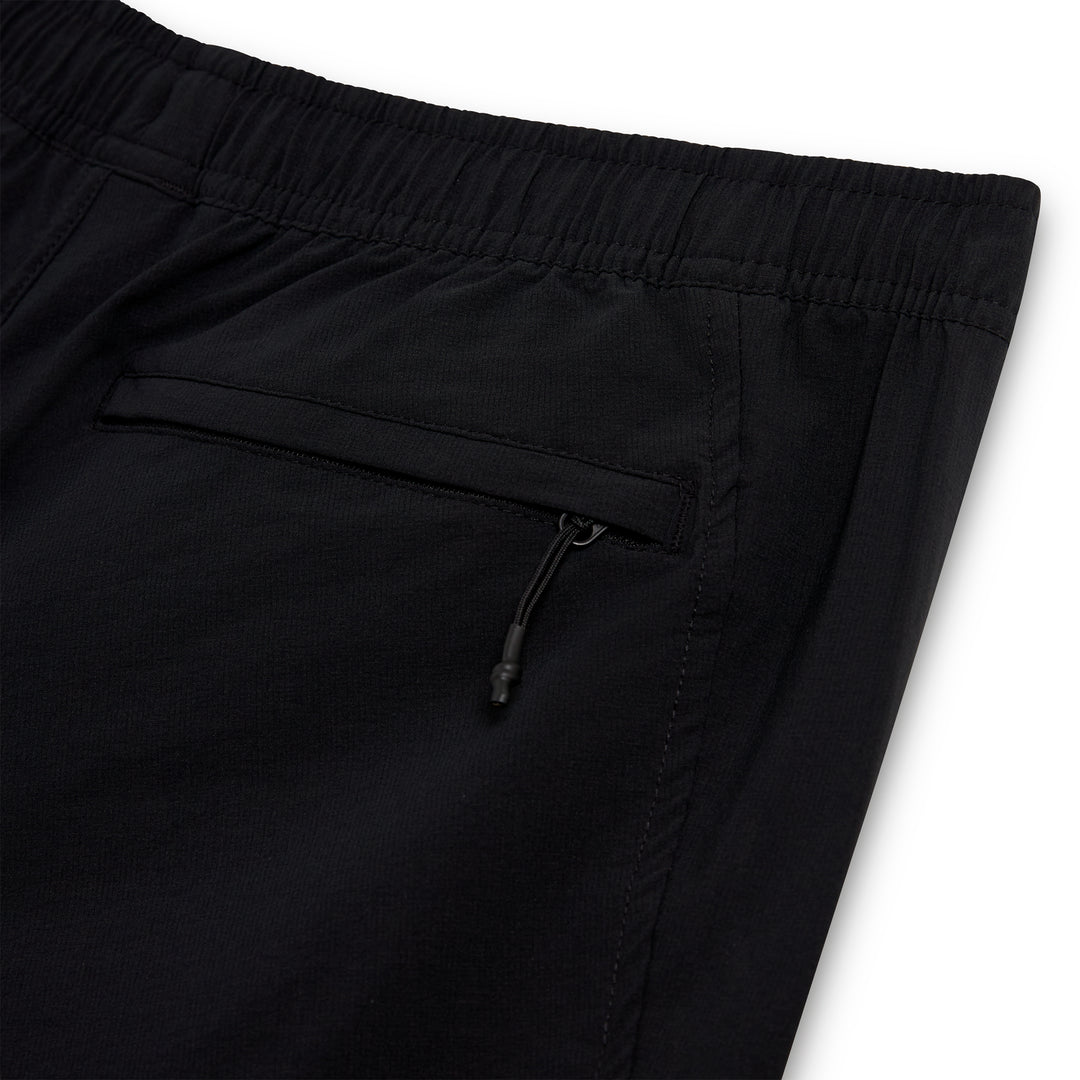 Close-up of a zippered back pocket on black CRBN x Florence Marine X Airtex Utility Short