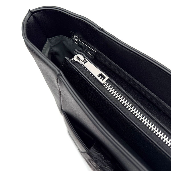 Interior view of black CRBN Club Pickleball Tote Bag with multiple zippered compartments.