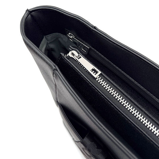 Interior view of black CRBN Club Pickleball Tote Bag with multiple zippered compartments.